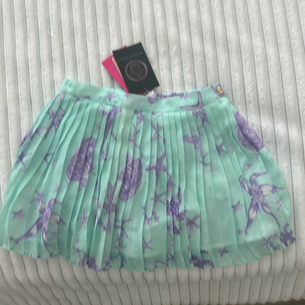 Young Versace GIRL skirt. ADJUSTable waist and 11.5” LONG. Brand NEW, never worn